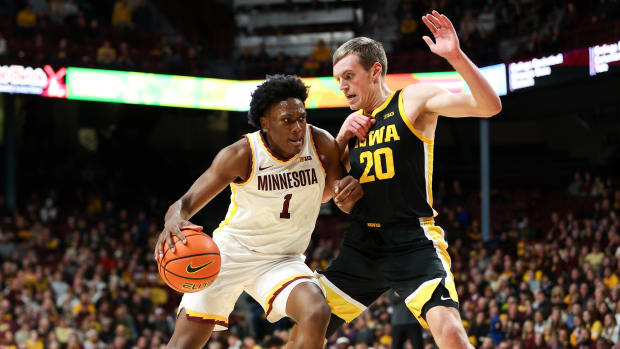 Josh Ola-Joseph drives on Payton Sandfort